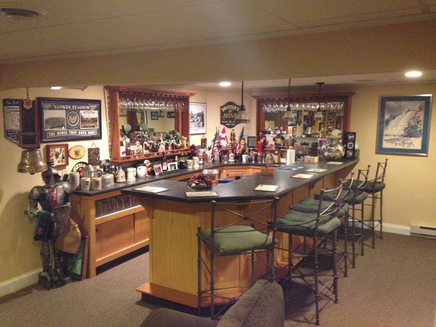 Finished entire basement including full bath, sleeping area, tv area and custom built bar (pictured)